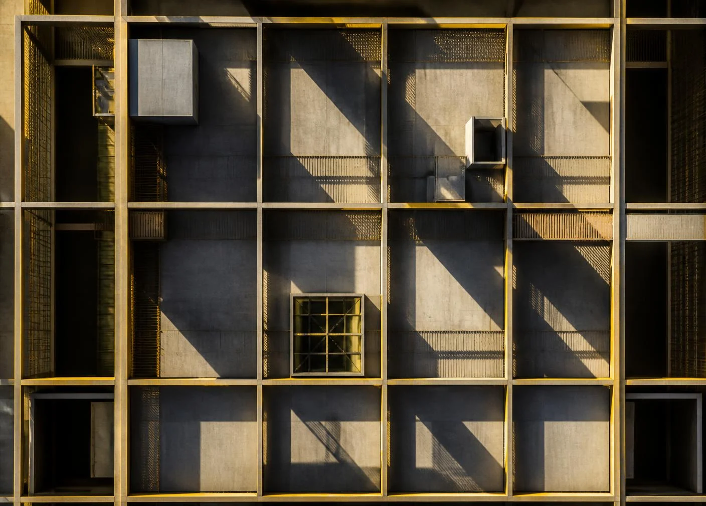 Aerial view of a modern architectural rooftop in warm light